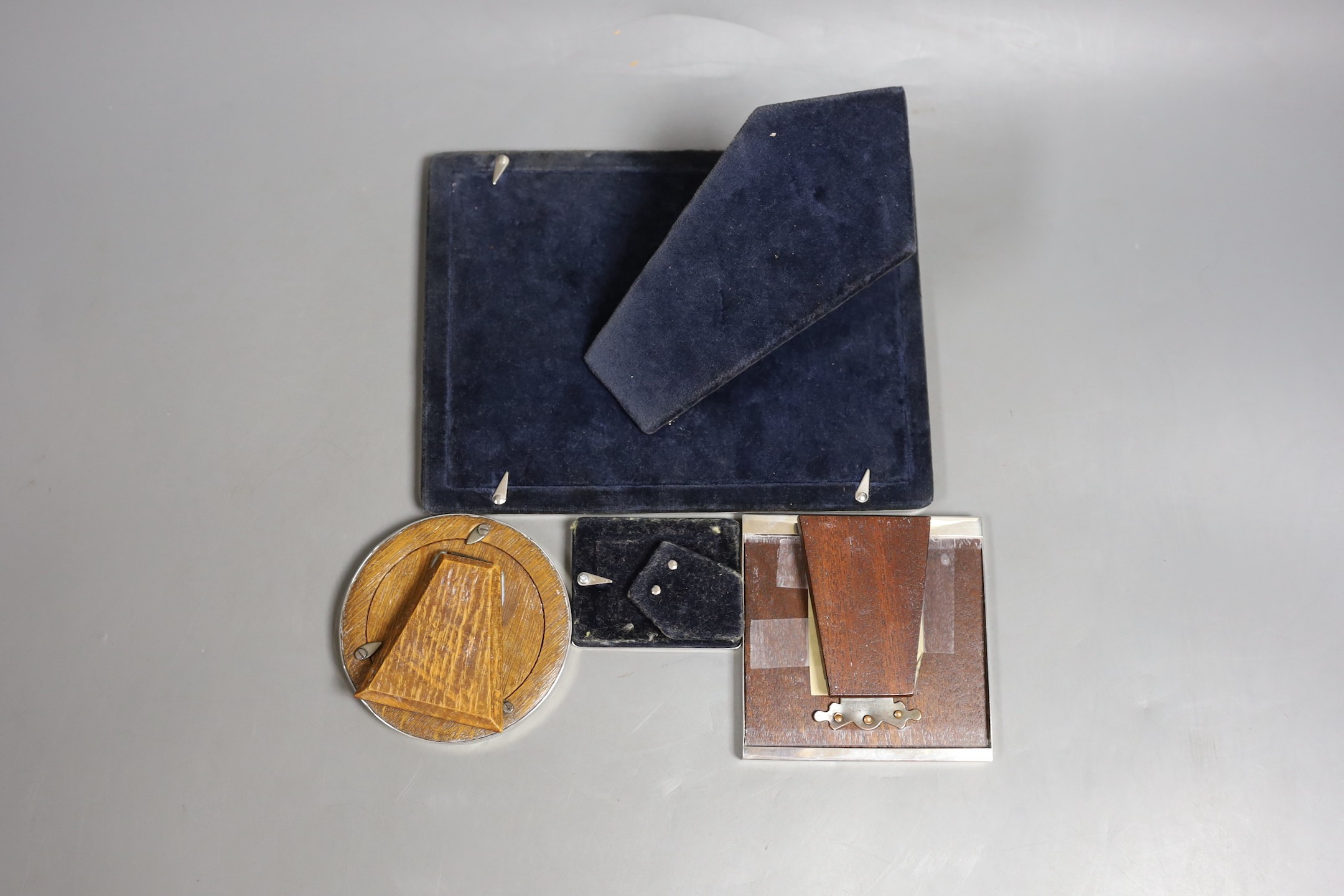 Four assorted silver mounted photograph frames, largest 20.4cm.